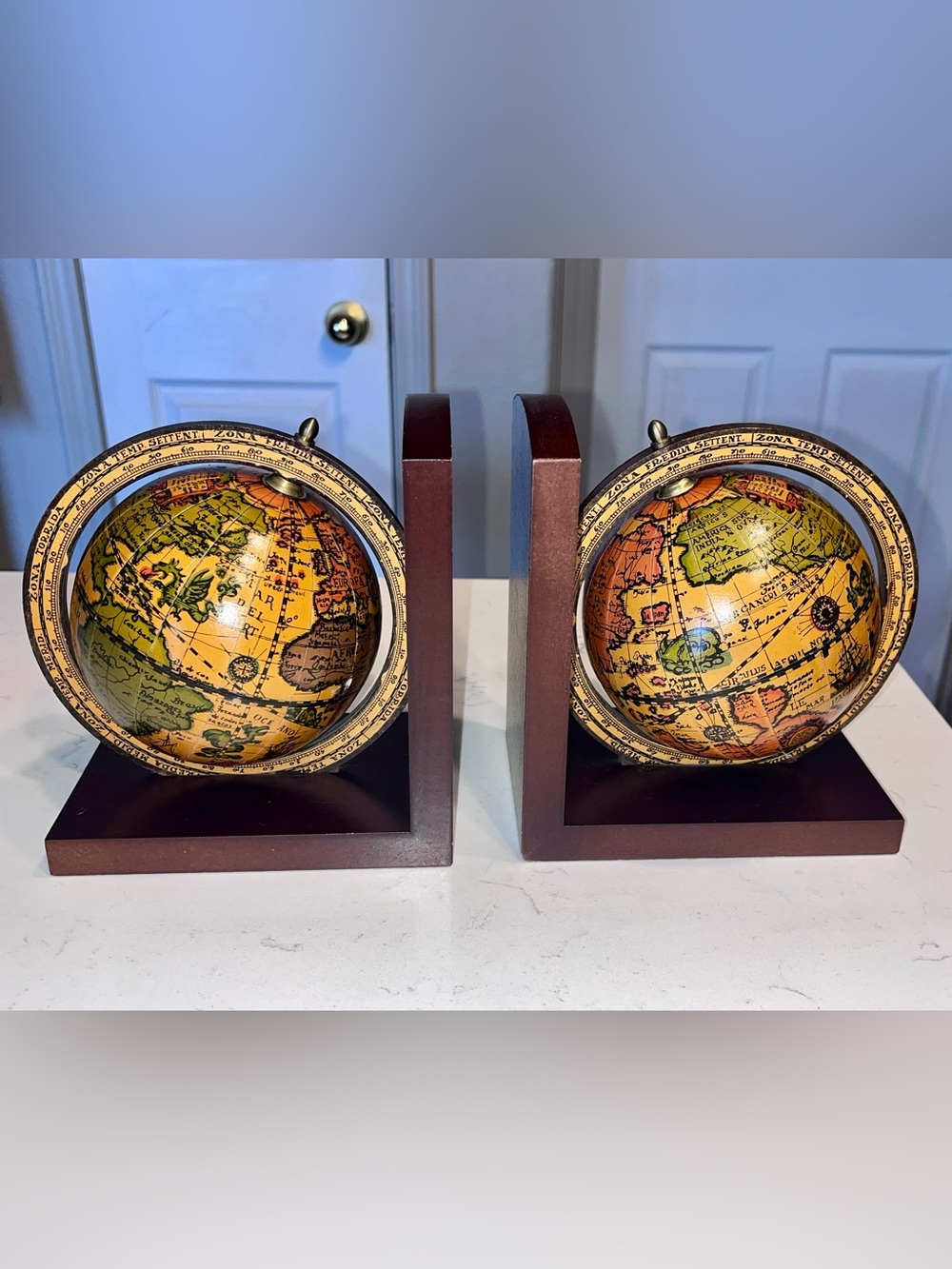 Italian mid-century "Old World" style spinning globe bookends